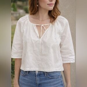 Zara cotton split-neck blouse.